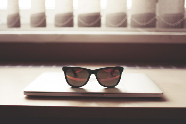 sunglasses and laptop
