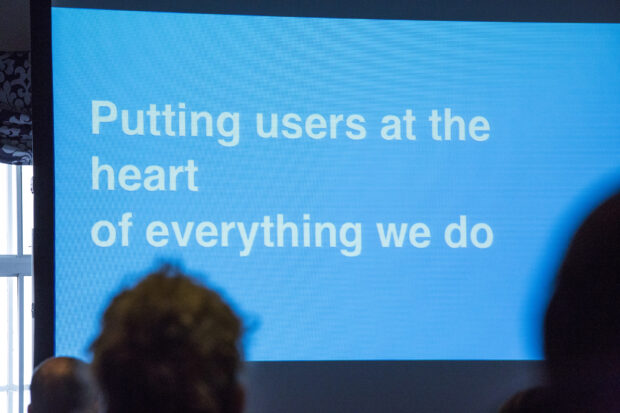 Presentation slide with the words 'Putting users at the heart of everything we do'